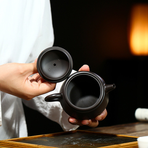 Yixing teapot wholesale new black mud tea Zen blind purple clay teapot famous artist carved tea set micro business delivery