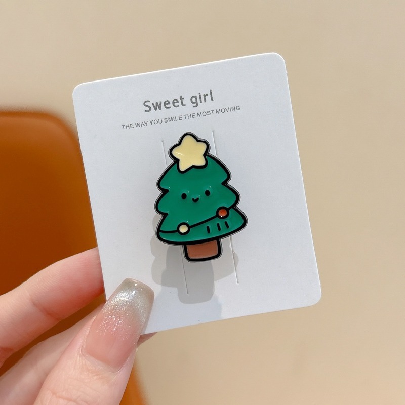 Broche de aleación de sentido avanzado japonés nueva insignia de personalidad de moda femenina de dibujos animados bolsa de Navidad accesorios de metal al por mayor