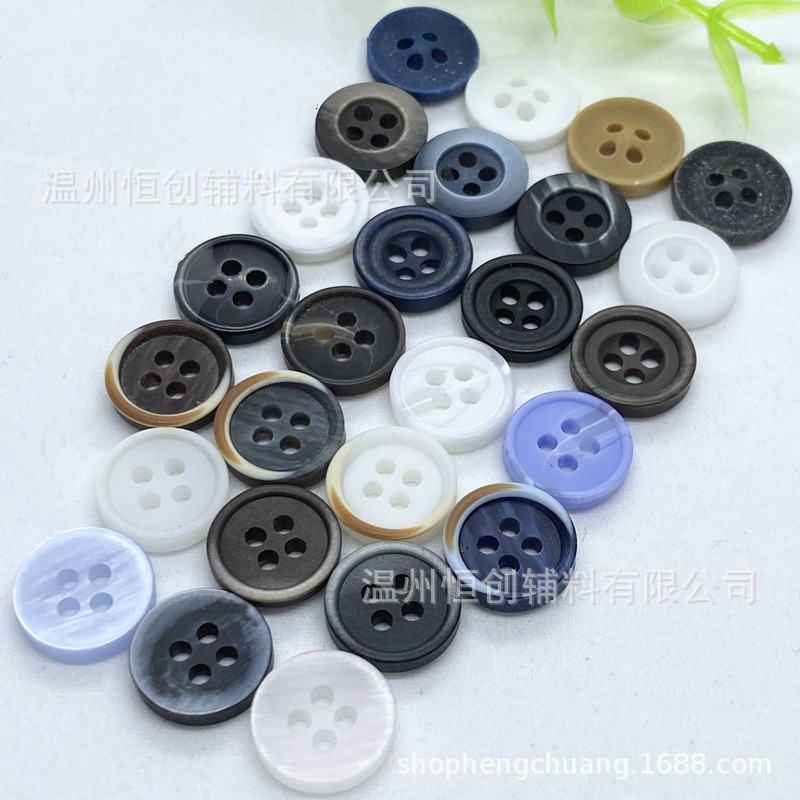 Resin button four -eye shirt buckle