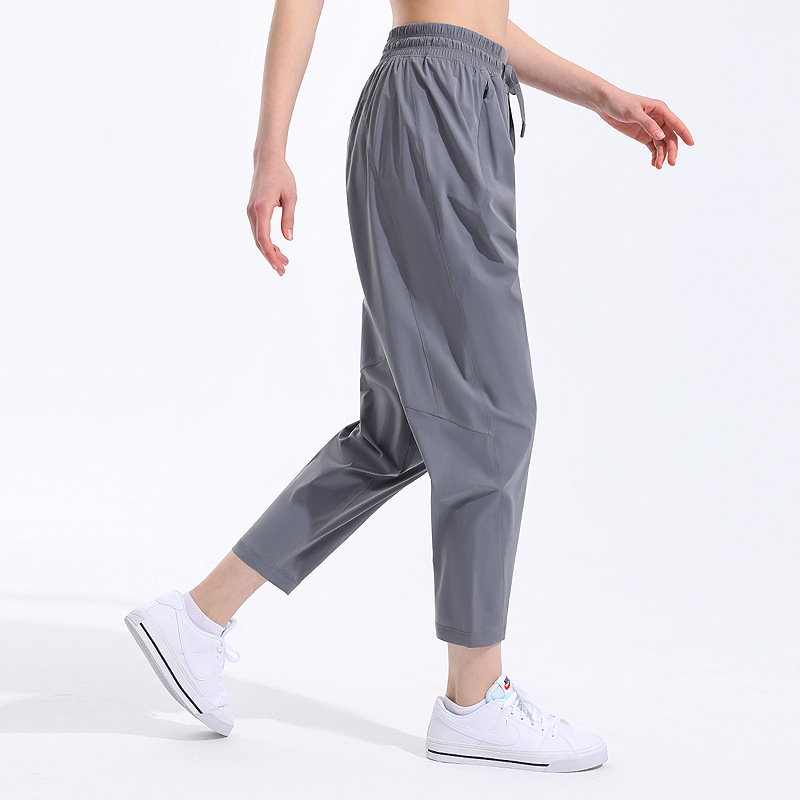 Nuevos pantalones casuales deportivos sueltos delgados transpirables cómodos pantalones de yoga para adelgazar Mediados de cintura danza fitness pantalones recortadas mujeres