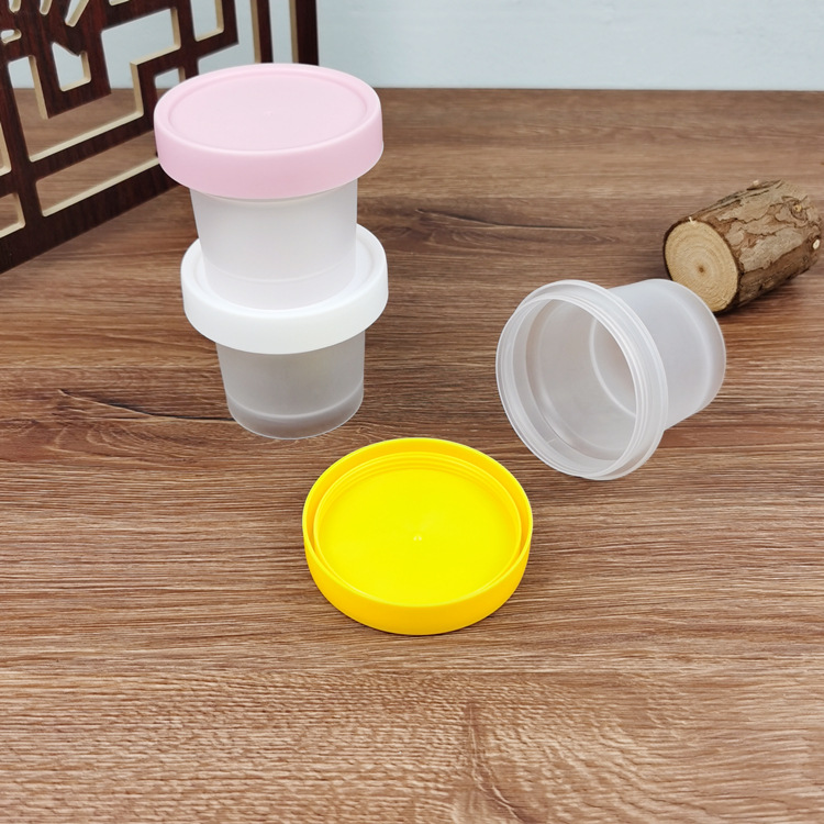 Fabricante 100ML de celebridades de Internet helado extracto frío yogur frasco leche pudín exfoliante transparente caja de mascarilla resistente a altas temperaturas