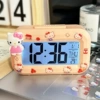 Pink alarm clock, standing KT cat, battery, stickers