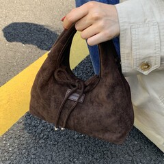 韩版麂皮绒蝴蝶结托特包女2025秋冬新款大容量百搭单肩斜挎水桶包