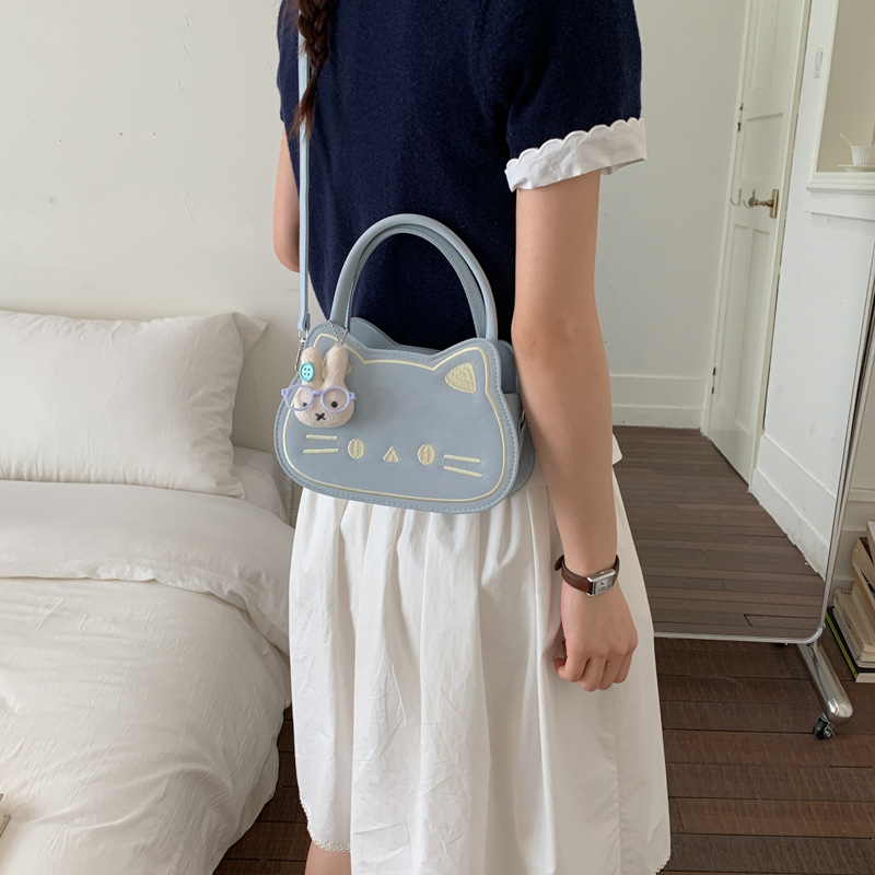 Diseño de nicho de dibujos animados pequeño bolso cuadrado adorable gato leche Hoh Hoh bolso de niña de moda de viaje de hombro mochila image 3