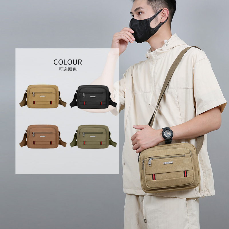 Comercio exterior nuevo bolso de hombro para hombres, bolso de lona de textura simple multicapa de gran capacidad, bolso de mochila de moda ligero