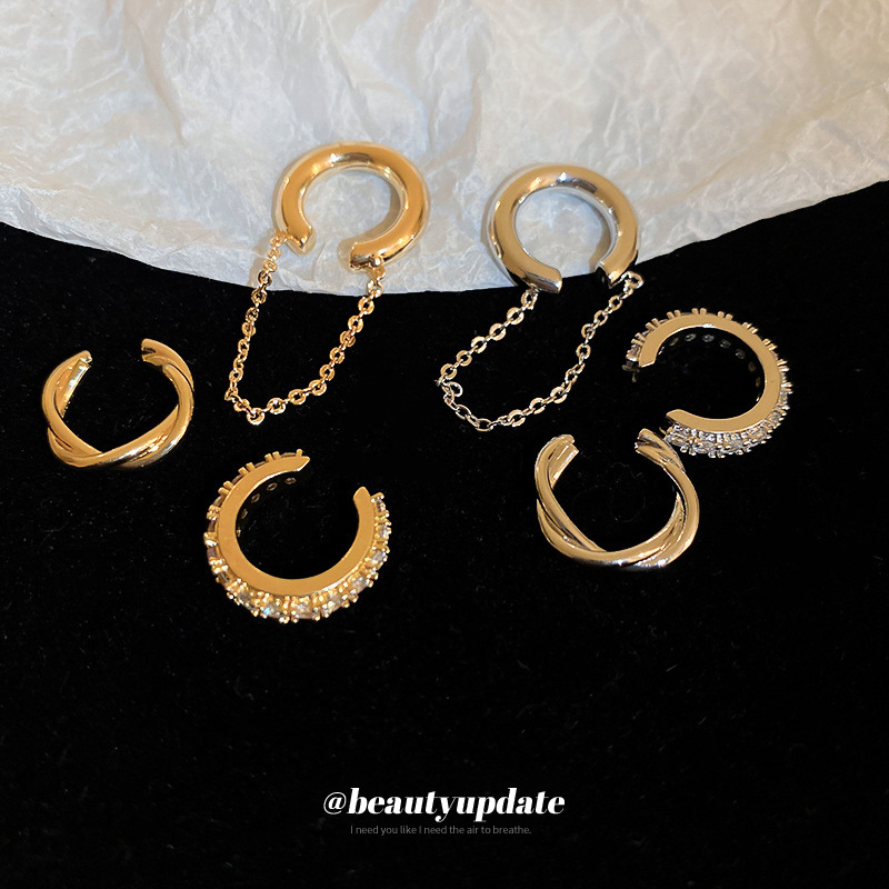 Diamante-incrustado ZIRCON clip de oreja conjunto de tres piezas temperamento personalizado estilo frío sin oreja clip de hueso de alta calidad nuevos pendientes para las mujeres