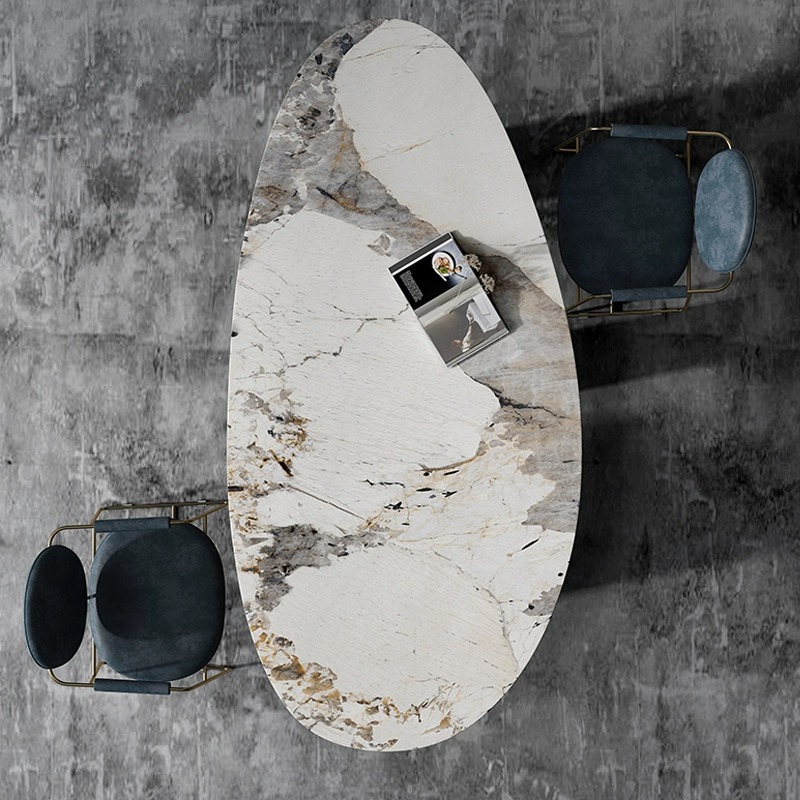 Estilo italiano Luz de lujo gota de agua Placa de roca mesa de comedor moderno diseñador simple pequeño apartamento casa Pandora mesa de comedor ovalada