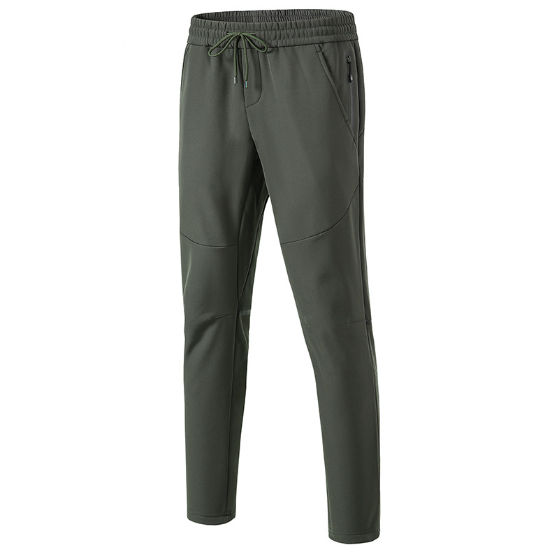 Pantalones de combate al aire libre hombres y mujeres pareja de invierno a prueba de viento impermeable forrado de lana deportes soft shell transpirable montañismo pantalones al por mayor