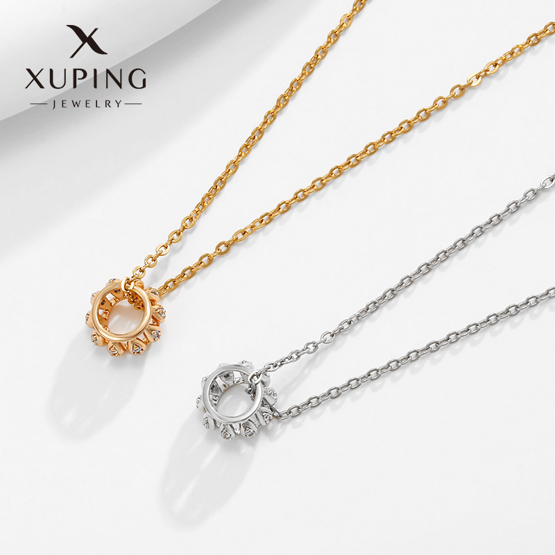 Xupe joyería de aleación con incrustaciones de circonio hueco redondo colgante femenino europeo y americano de moda de lujo nicho temperamento exquisito colgante