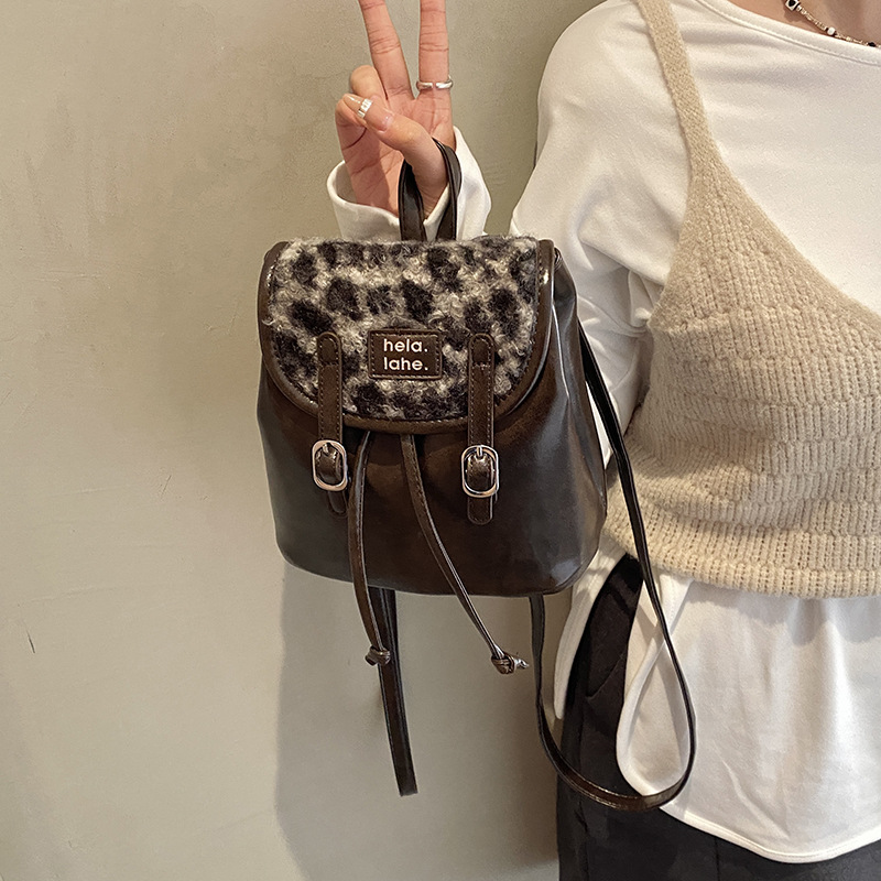 Mochila popular coreana para niños y niñas, mochila de estilo de estilo de la universidad, nueva mochila de invierno y otoño para niños estampados de lana