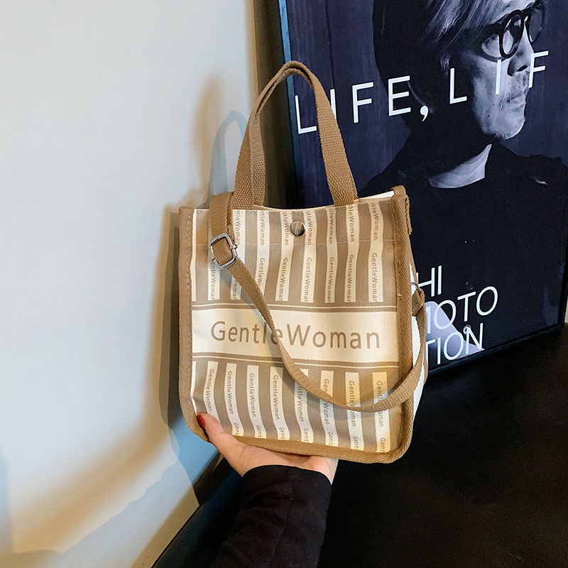 Moda rayas bolsa de lona para mujeres 2023 nueva carta impresión portátil bolsa de compras bolso de hombro al por mayor