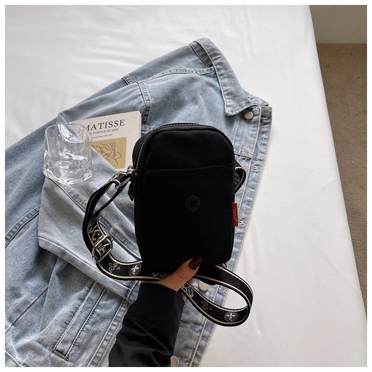 Bolso de nylon de moda para mujeres 2026 nuevo bolso de teléfono móvil ligero casual simple bolso de transporte de viaje