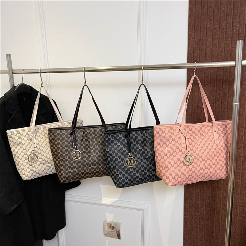 Bolsos de alta gama, bolsos de cercanías, bolsos de moda de primavera y verano para mujer, nuevos bolsos de hombro de moda, bolsos simples de gran capacidad