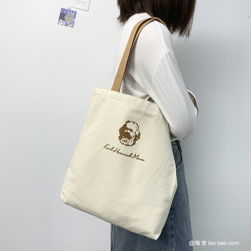 Nuevo bolso de lona de otoño e invierno para hombres y mujeres simple todo partido artístico de un solo hombro bolsa de Protección Ambiental portátil artístico