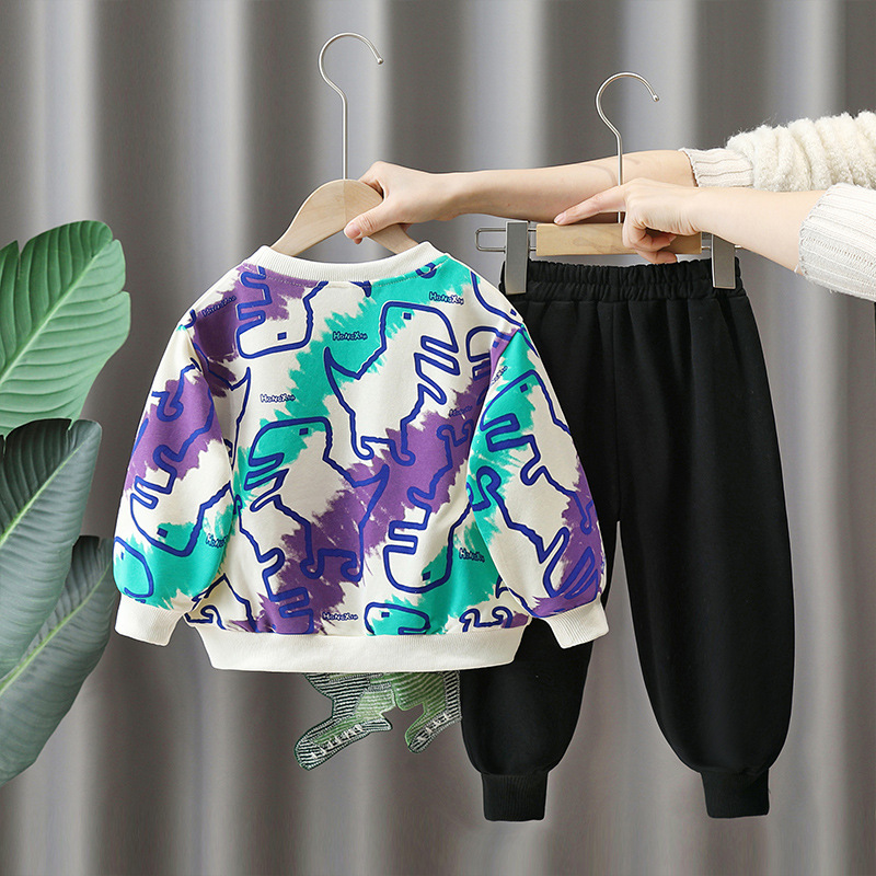 6147 Traje de dinosaurio para niños Otoño 2025 Nuevo suéter de dibujos animados para niños Estilo de primavera y otoño para bebés Conjunto de dos piezas de estilo occidental