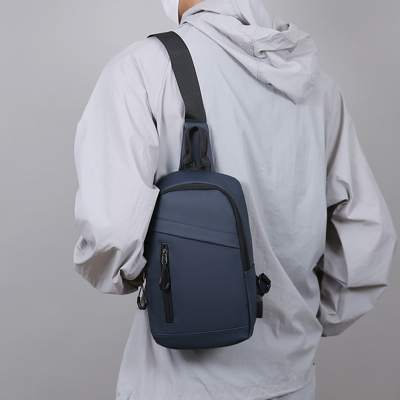 Bolso de pecho mayorista de hombre nuevo estilo de moda, bolso de hombro de viaje ligero multifuncional, bolso de mochila casual simple