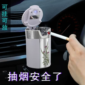 Hanging car ashtray, creative and personalized, with a cover, multifunctional, for car air vents, with night light for the car interior