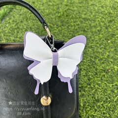 越境してよく売れているかわいい蝶結びの革のキーホルダーのペンダントの小さい清新な皮革の蝶の形のカバンは飾りを掛けます。