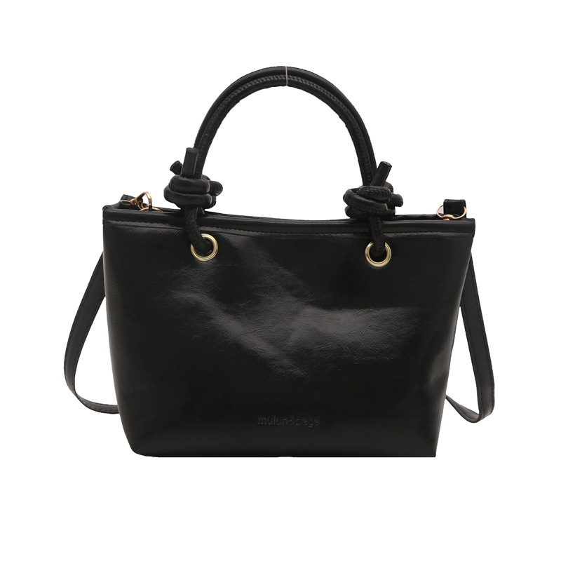 Bolso de moda simple 2024 invierno nuevo estilo retro textura bolso de cubo de moda color sólido viaje mochila de hombro