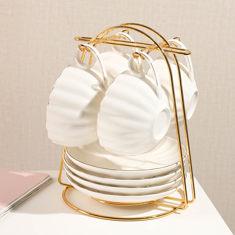 Comercio exterior de cerámica taza de café platillo juego de té regalo simple flor taza de té hogar taza de agua café traje de regalo con estante