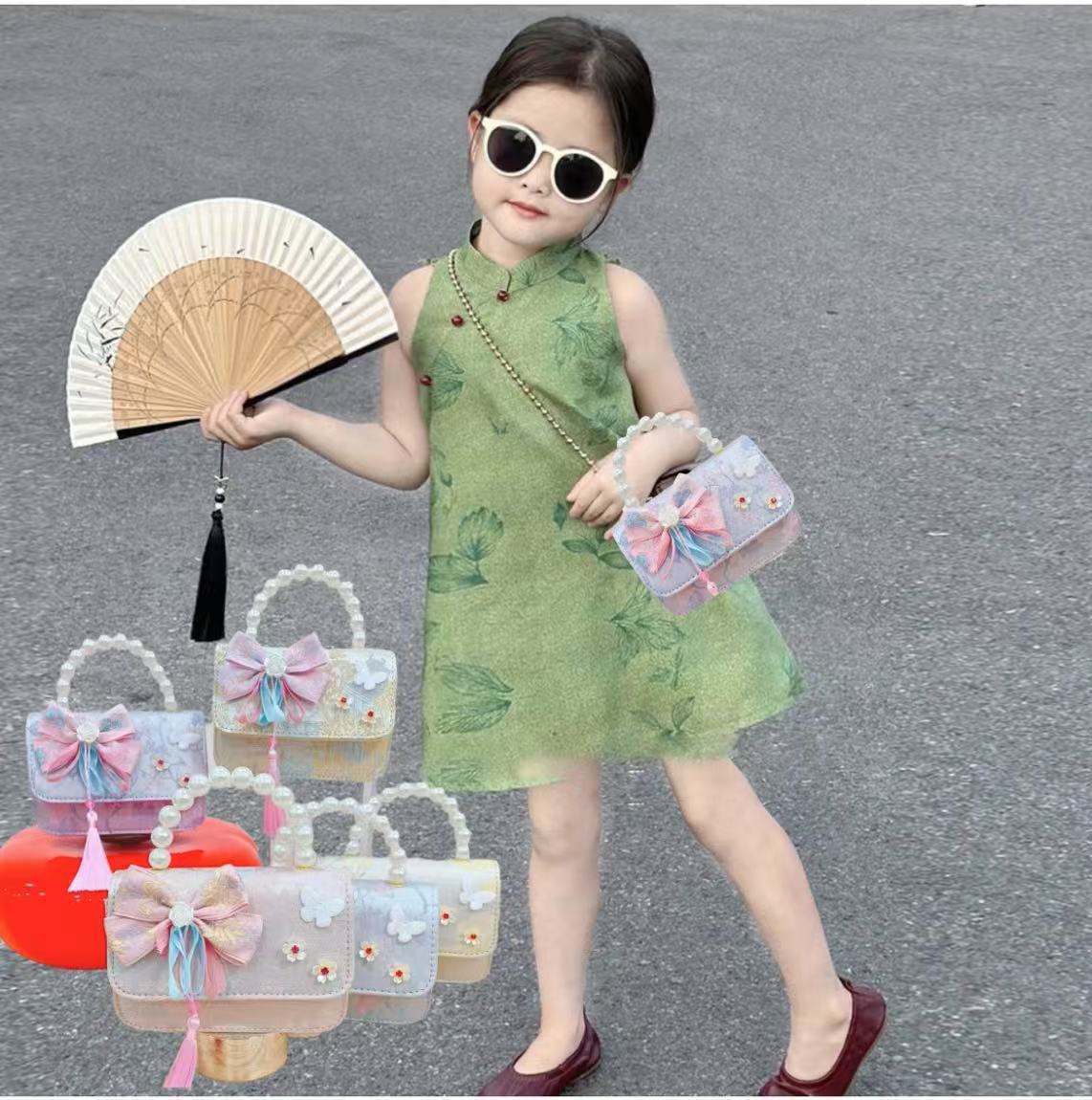 Niños pequeños viento fragrante hombro alto sentido de la chica antigua bolso de cambio princesa perla accesorios de ropa china portátil mochila