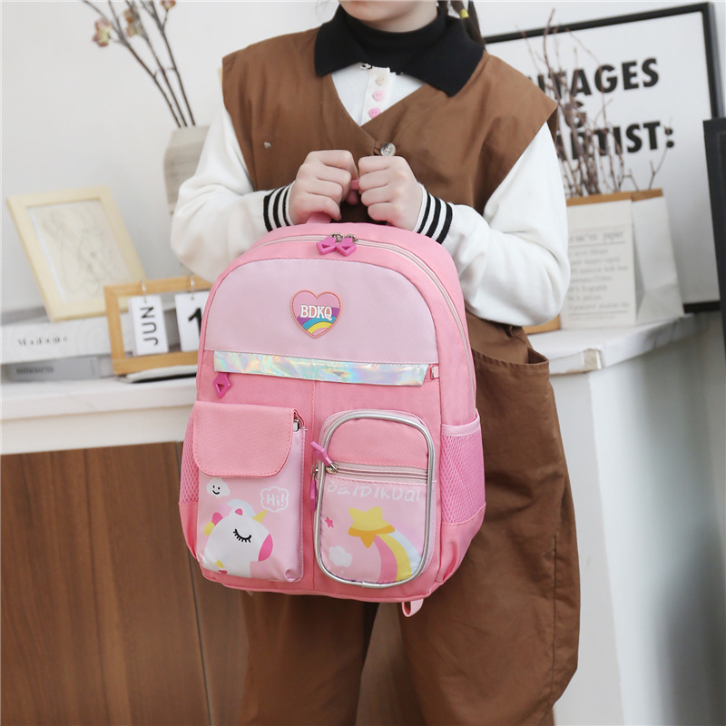 Comercio exterior nueva mochila de dibujos animados Grado 1-3 estudiante de la Escuela Primaria de gran capacidad de protección de la columna vertebral bolsa ultraligera