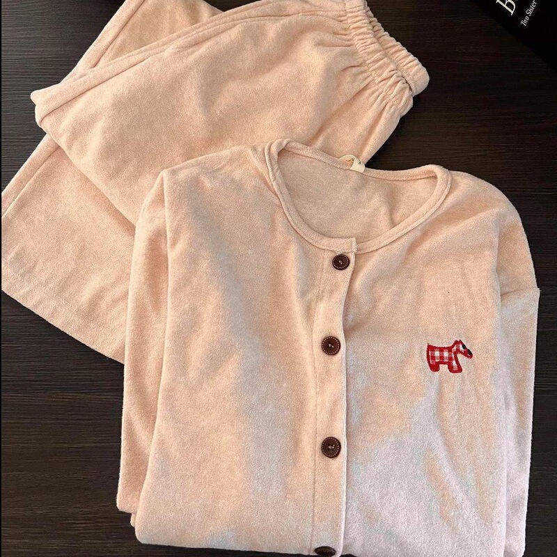 Trendy and stylish German velvet long-sleeved and long-legged pajama set featuring cute cartoon dog designs, with a loose and minimalist style Trendy and stylish German velvet long-sleeved and long-legged pajama set featuring cute cartoon dog designs, with a loose and minimalist style