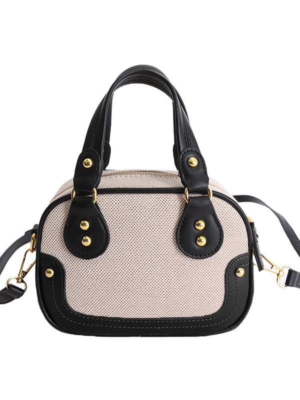 Hot sale nuevo lienzo empalme color contraste bolos portátiles de textura alta pequeña parte coreana nicho mochila de hombro