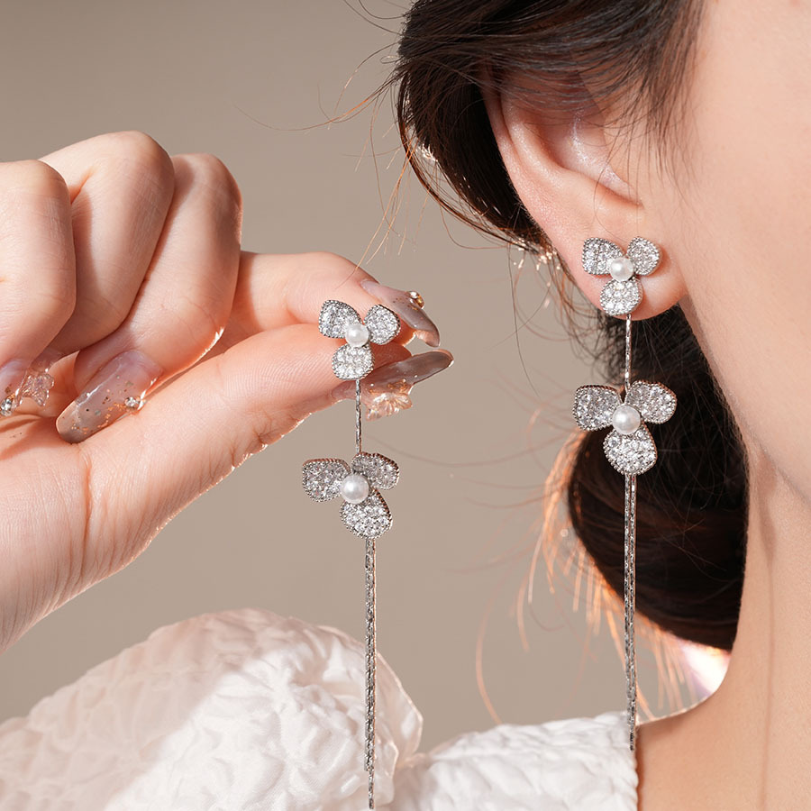 Pendientes de perlas de flor de circón de aguja de plata, pendientes de lujo de alta gama de lujo ligero exquisito, pendientes de todo fósforo blanco de moda de nicho al por mayor