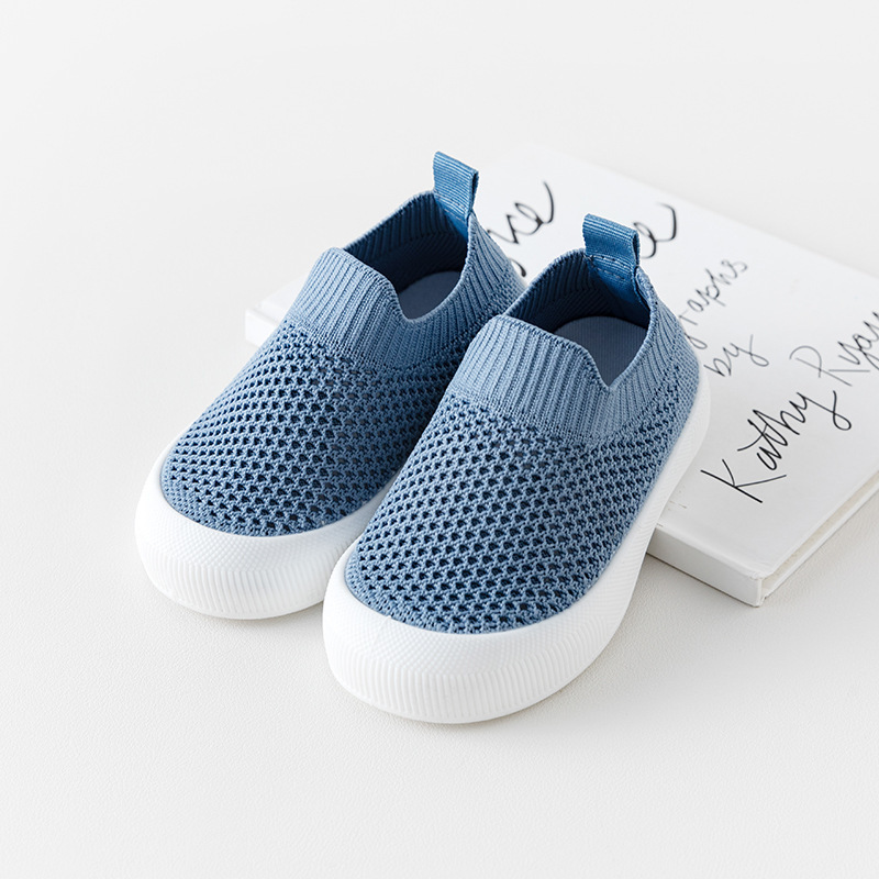 Primavera y verano zapatos de malla voladora transpirables para bebés zapatos para niños pequeños de suela blanda anticolisión para bebés zapatos casuales de azúcar para niños y niñas al por mayor