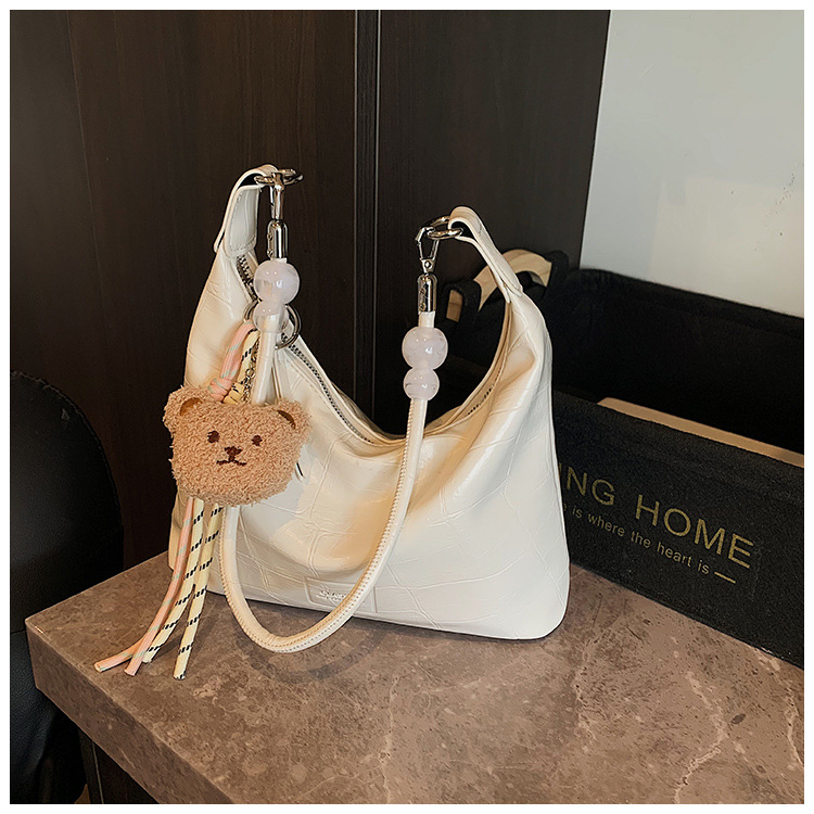 In the summer of 2025, crossbody bags, women's bags, single-shoulder bags, versatile casual bags, sports underarm bags, soft leather bags, dumplings, and women's bags undefined
