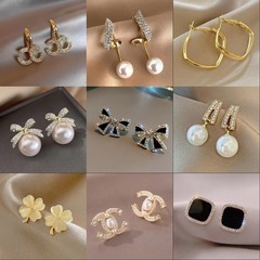 売れ筋の日本と韓国のパールイヤリング、万能イヤリング、キャッツアイイヤリング、インシンプルイヤリング、女性用卸売