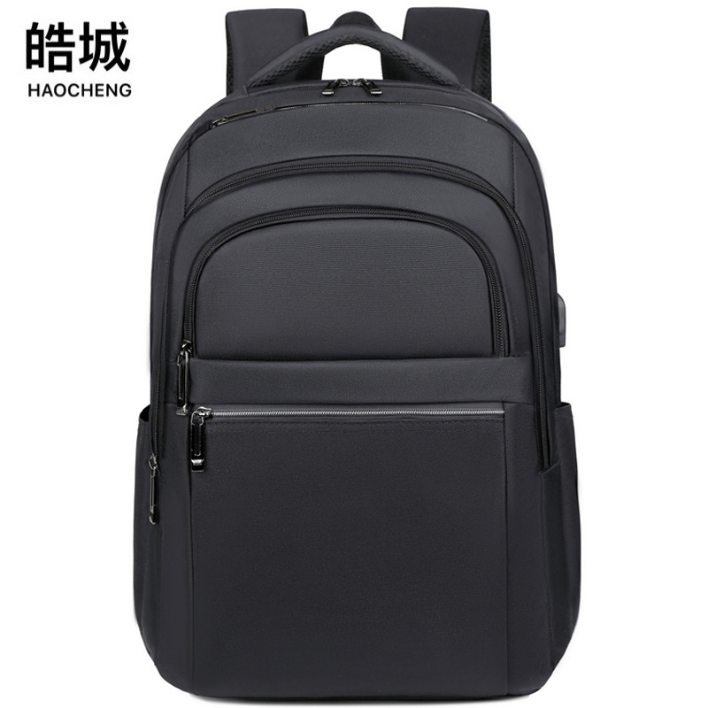 2024 nueva mochila de tela Oxford de gran capacidad para hombres con carga USB, mochila para computadora de ocio de negocios, bolso para estudiantes