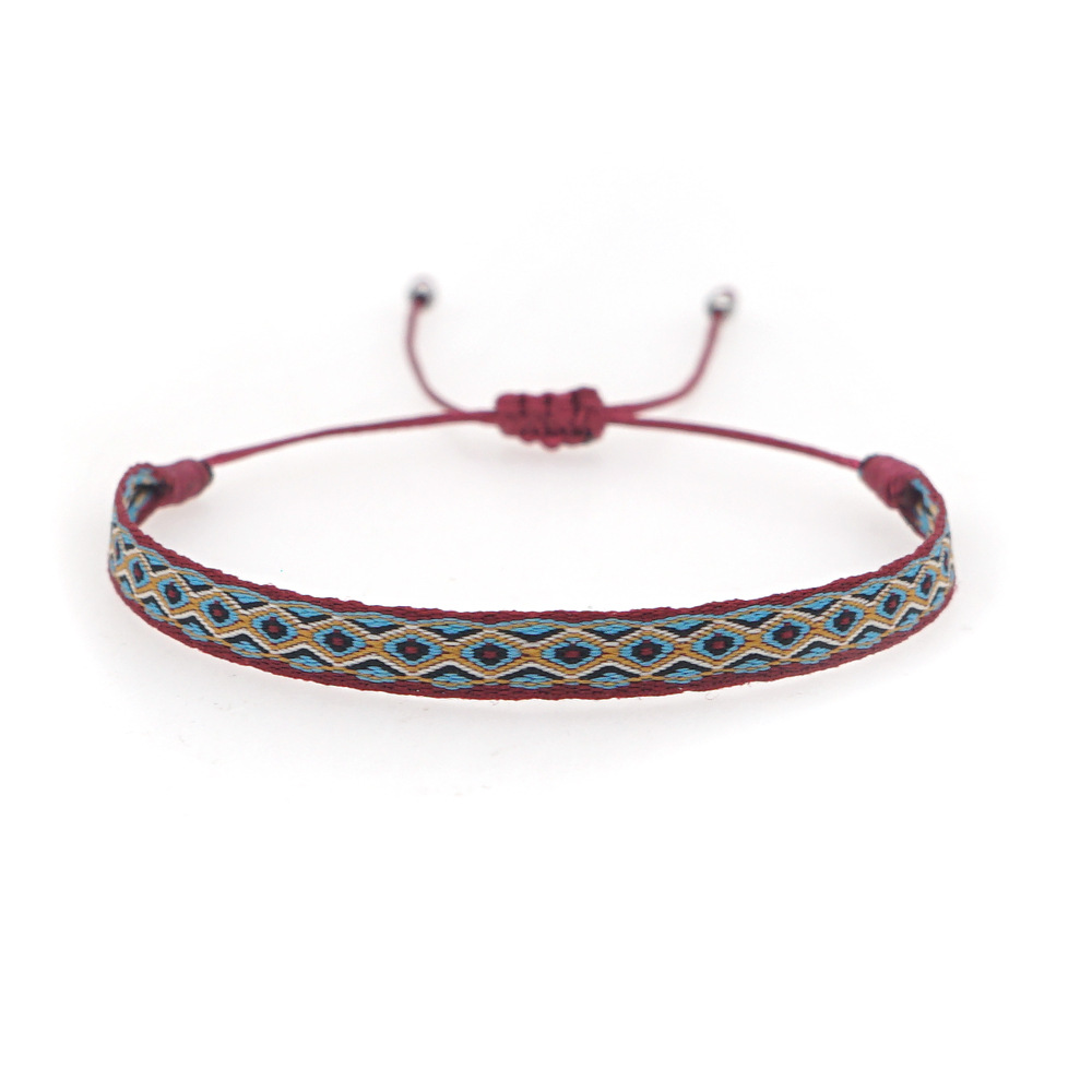 Bracelet De Couleur Contrastante Tissé À La Main Avec Ruban Ethnique Rétro Colombien Bohème display picture 5