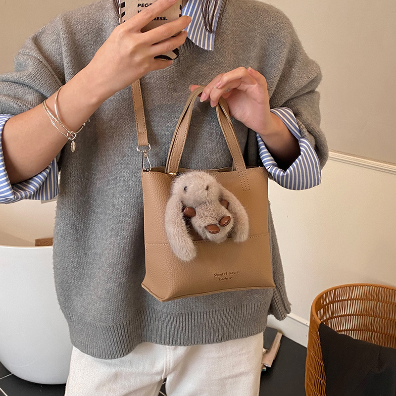 Bolso de cubo de mano coreano, bolso de hombro para mujeres extranjeras 2025, nuevo estilo de alta calidad, simple bolso de transporte