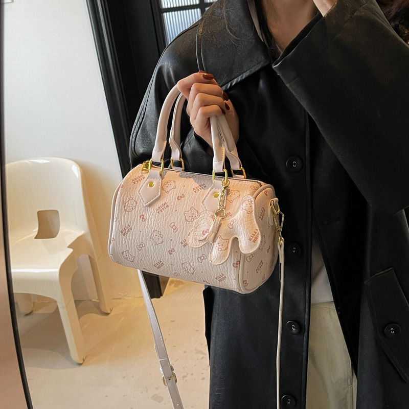 洋气时尚手提保龄球包女2025春季新款可爱少女卡通印花单肩斜挎包