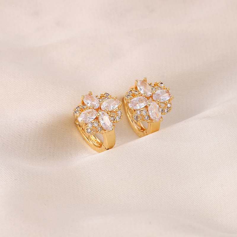 DongDamen simple lujo ligero alto sentido nicho de diseño único bucles de orejas de cobre micro-incrustado 18 quilates oro retrógrado pendientes únicos
