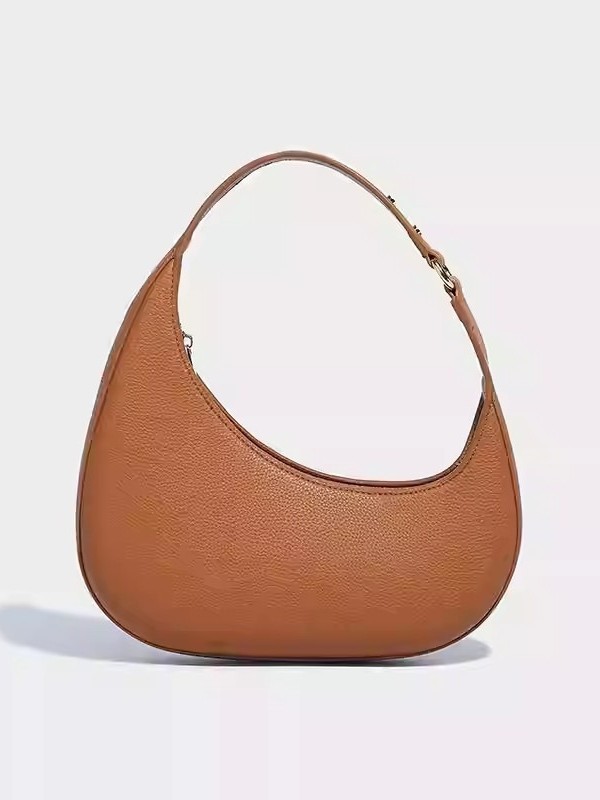 2025 nuevo diseño de nicho de moda europea y americana, bolso de luna creciente irregular en forma de media luna, bolso de axila de alta gama, mujer