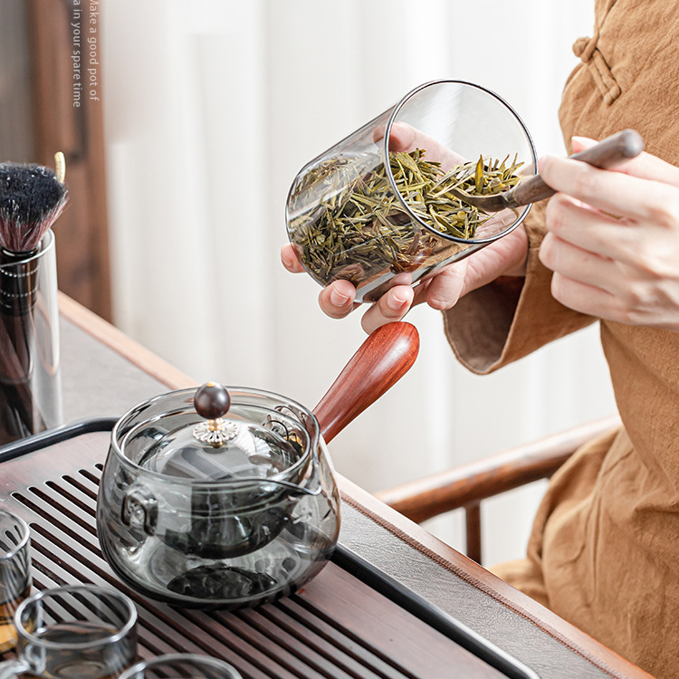 Mango de madera lateral de vidrio de borosilicato olla de ocio 360 ° revestimiento giratorio fabricante de té hogar estufa de cerámica eléctrica tetera