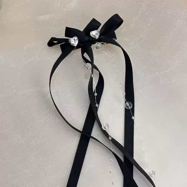 Black hairgrip with bow with tassels