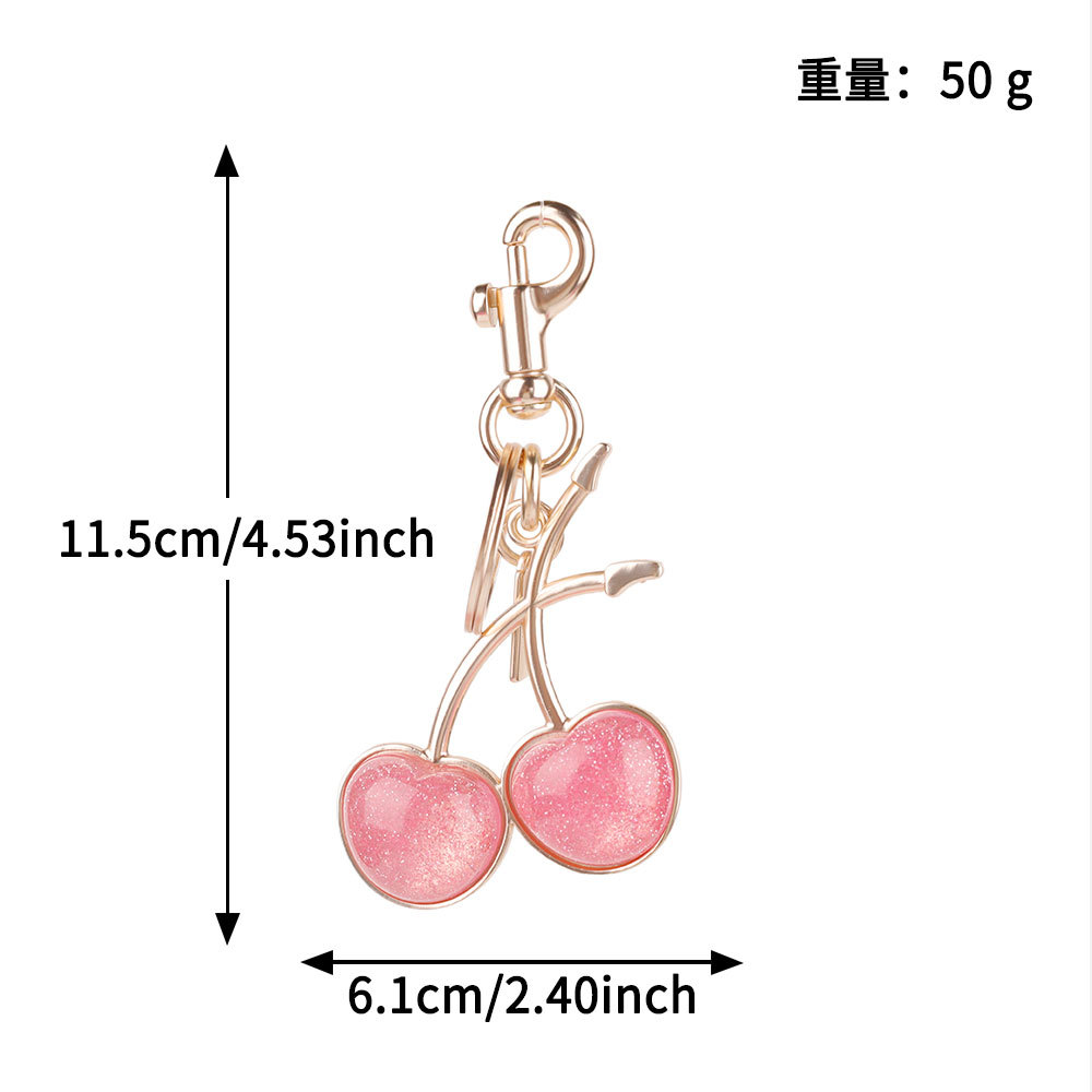 Transfronterizos directamente para bolsas de cereza colgantes de moda llaveras de automóviles llaveras de Amazon llaveras de metal accesorios de bolsas al por mayor