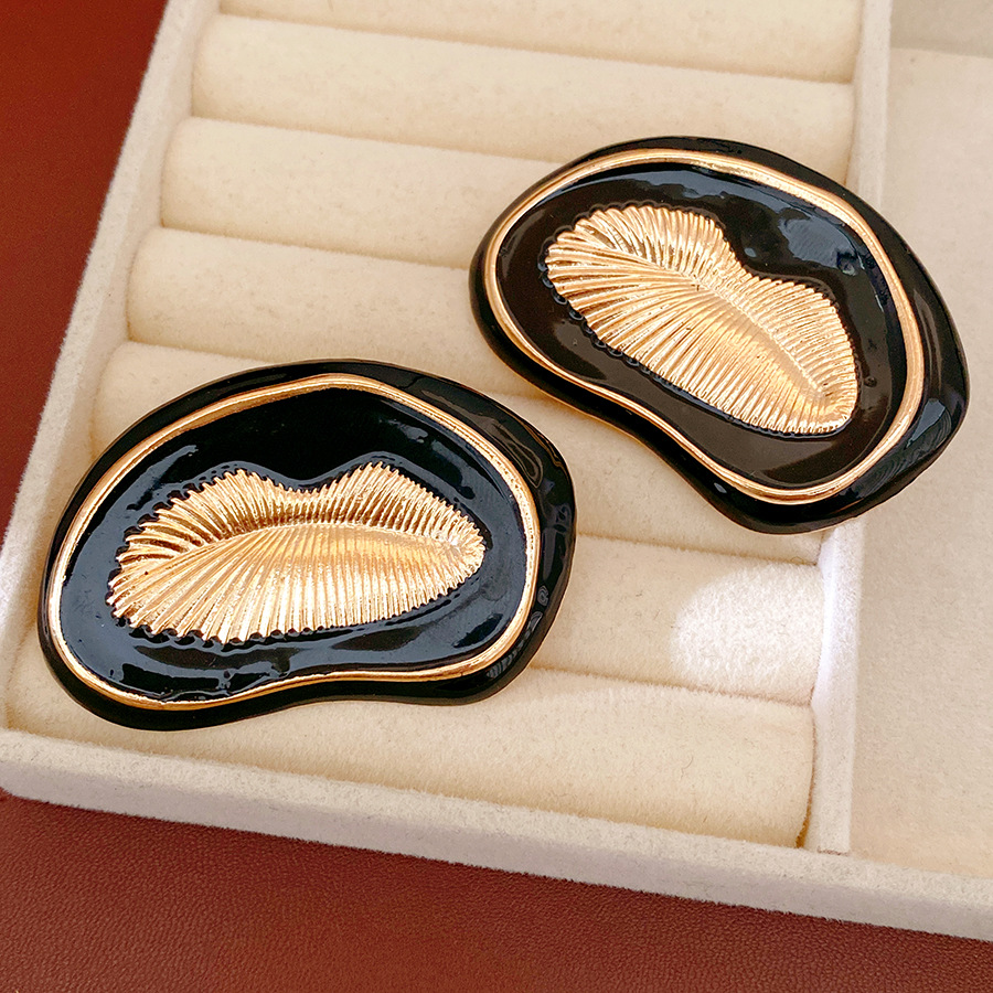 Aguja de plata goteo de aceite plegado pendientes redondos lujo ligero de alto nivel pendientes de estilo europeo y americano nicho exagerado conjunto de joyería al por mayor
