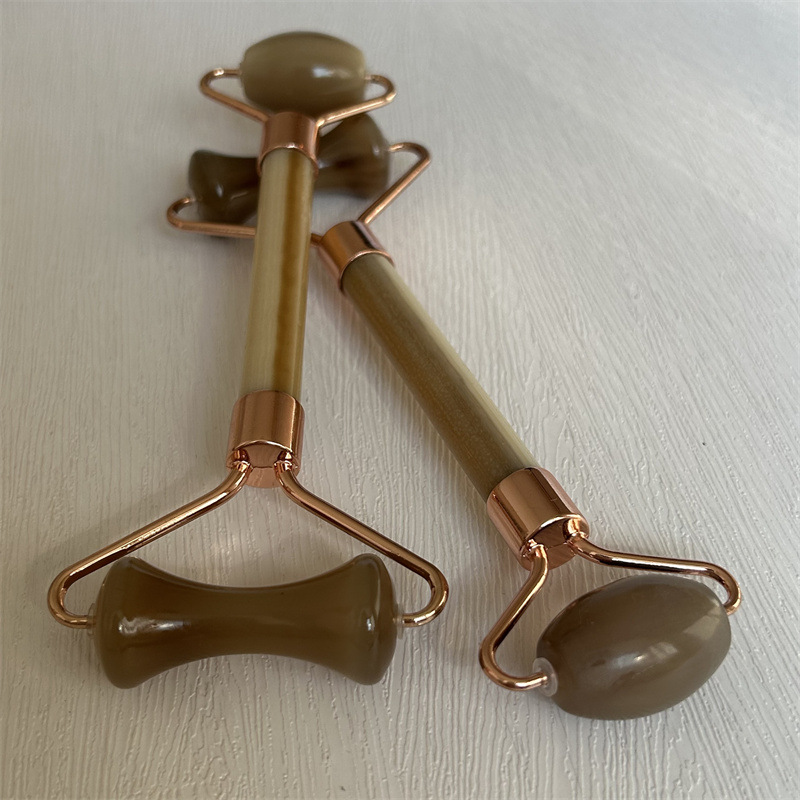 Horn Facial Massage Tool Double Head Roller Gua Sha Beauty Device 15cm in use