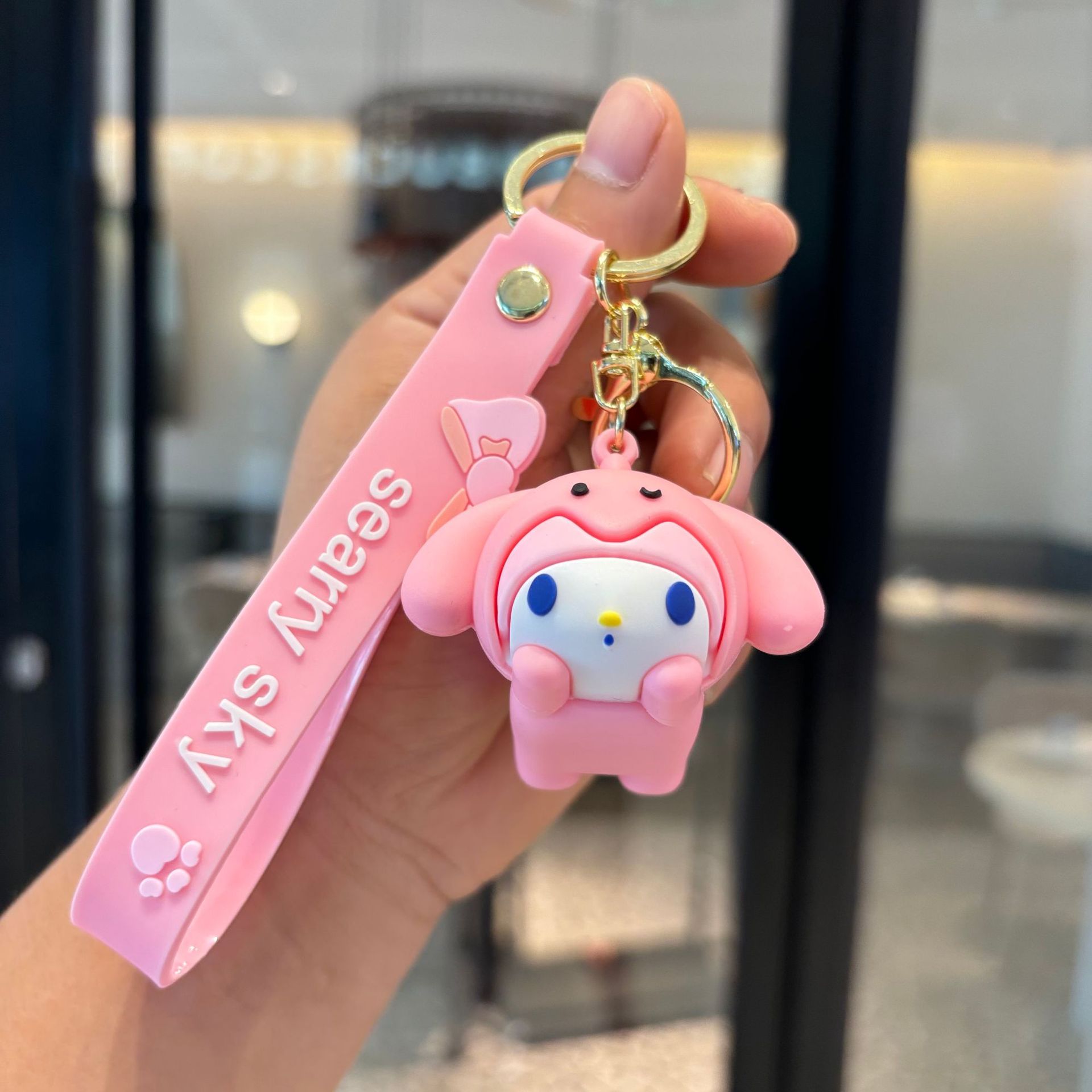 Caricatura Sanrio llavero colgante de muñeca Kulomi bolso de coche llavero muñeca máquina pequeña regalo al por mayor