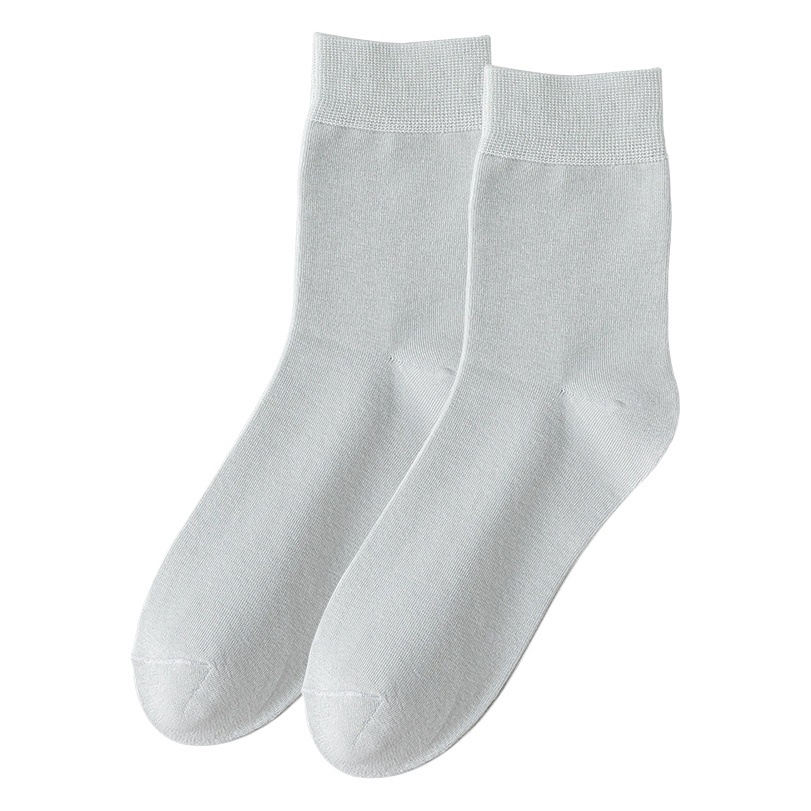 Medias de algodón peinado para hombres de negocios Zhuji calcetines de algodón al por mayor Primavera y otoño calcetines de media pantorrilla calcetines de algodón de color sólido para hombres