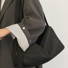 日韩新款大容量手提包蝴蝶结单肩斜挎包羽绒棉休闲手提包女工厂