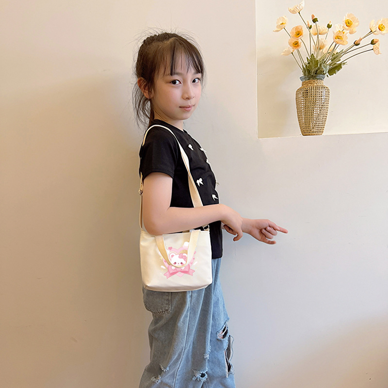 Cartoon bear, bolsas de hombro para niños y niñas, impresión de aire extranjero, bolsas de mano para bebés dulces, bolsas para niños 2025 nuevas bolsas para niños