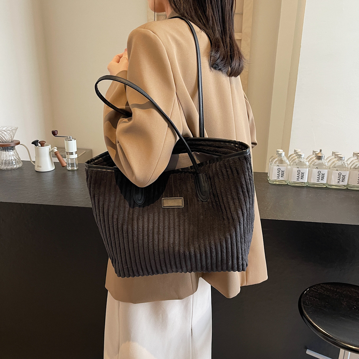 Verano 2024 invierno de gran capacidad de meandruño nuevo nicho simple de viaje de mano bolsa de hombro para mujeres