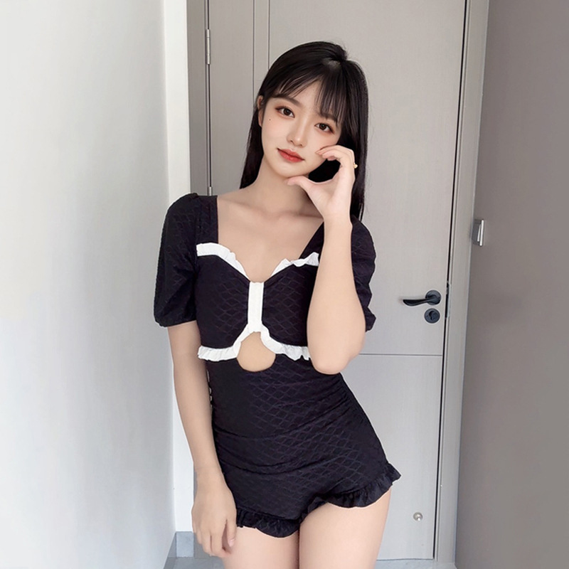 Traje de baño de una pieza de verano para mujer, ángulo plano, viento puro, hueco, sexy, cubrir el vientre, delgado, baño de vacaciones de aguas termales, traje de baño al por mayor