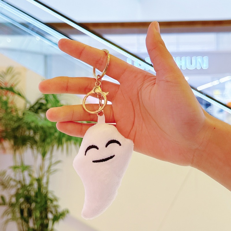 ハロウィーンのかぼちゃのキーホルダーのかばんはかわいいぬいぐるみの幽霊のリュックサックを掛けて子供の機械の露店を飾って卸売りします。|undefined